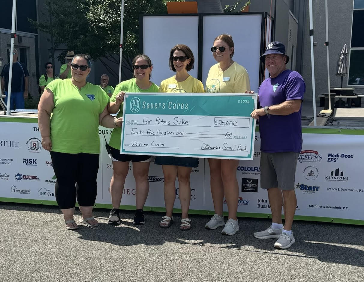 Sauers Cares presenting a $25,000 check to For Pete's Sake